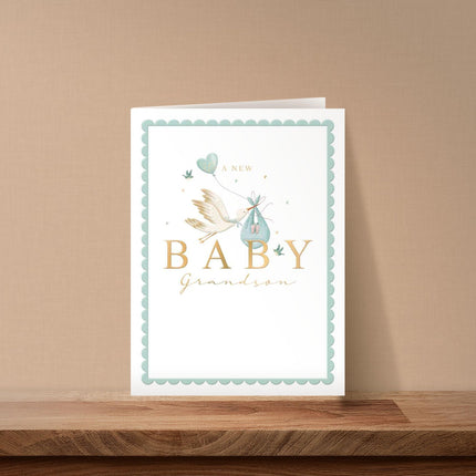 Congratulations Card for New Baby Grandson - Cute Blue Stork & Love Heart Balloon - Embossed Gold Foil Finish - Premium Special Arrival Greeting Card with Envelope