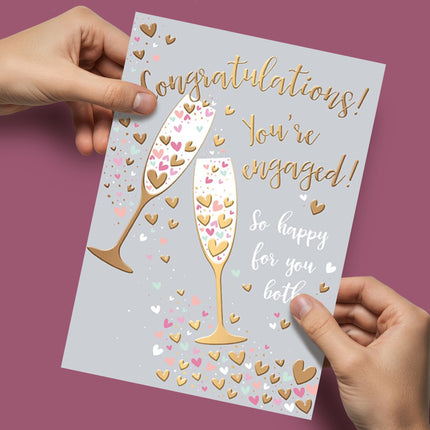 Engagement Card – Champagne Toast & Hearts Design with Gold Foil
